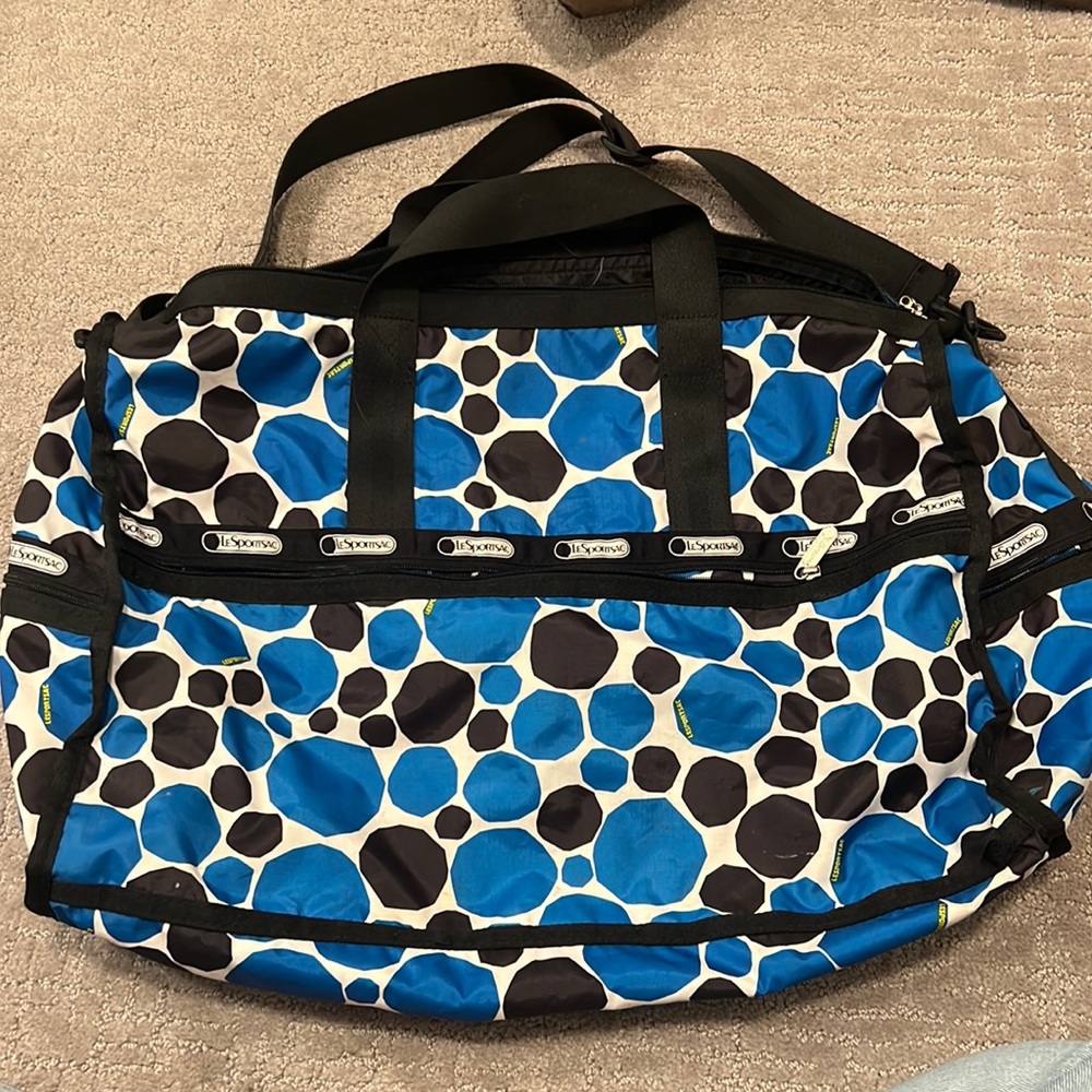 Lesportsac large blue black abstract duffle bag; hand strap and long crossbody